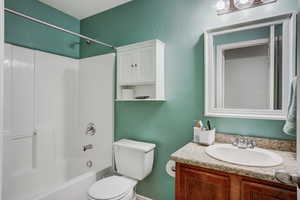 Full Bathroom with Updated Lighting & Mirror with Added Storage Above Toilet