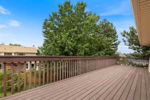 View of deck from first bedroom on second floor