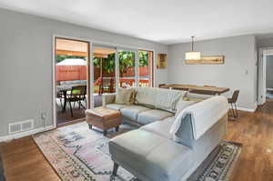 Living room featuring wood-type flooring