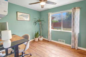 Office featuring light wood-type flooring and ceiling fan