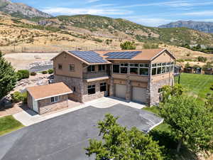 Drone / aerial view featuring a mountain view