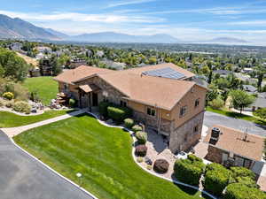 Drone / aerial view featuring a mountain view