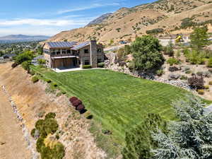 Drone / aerial view featuring a mountain view