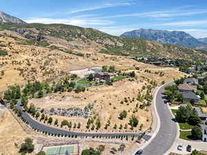 Birds eye view of property with a mountain view