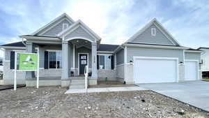 View of front of home with a garage