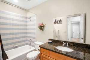 Hall bath, tile shower and floors