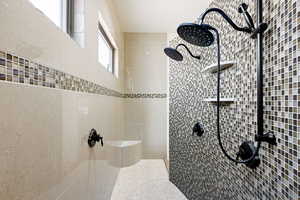 Master Bathroom featuring tiled shower