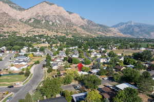 Birds eye view of property with a mountain view