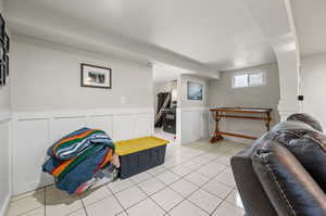 Playroom with light tile patterned flooring