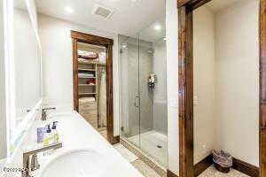 Bathroom with shower with separate bathtub