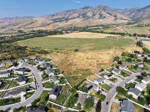 Drone / aerial view with a mountain view and a rural view