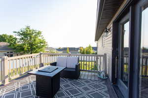 Exterior space featuring an outdoor living space with a fire pit