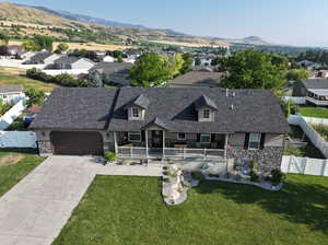 Drone / aerial view featuring a mountain view