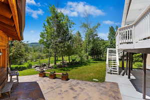 View of patio / terrace featuring a deck