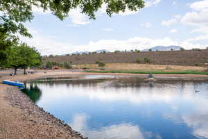 Property view of water featuring a mountain view