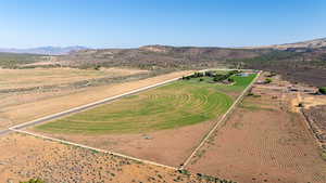 Drone / aerial view featuring a mountain view and a rural view