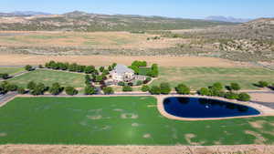 Aerial view with a mountain view and a rural view