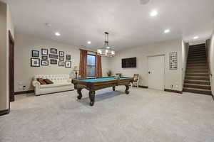 Rec room featuring light carpet and pool table