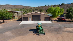 Garage featuring a mountain view