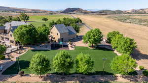 Drone / aerial view with a mountain view and a rural view