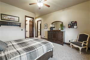 Bedroom featuring light carpet and ceiling fan