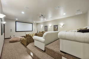 View of carpeted home theater room