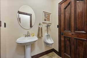 Bathroom featuring tile patterned flooring