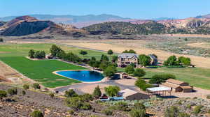 View of swimming pool with a mountain view