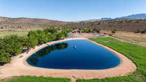 View of pool with a mountain view