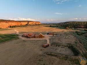 Birds eye view of property with a rural view