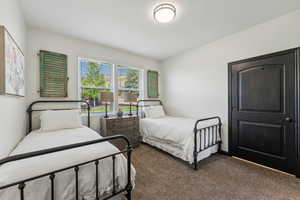 Bedroom with carpet flooring