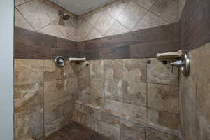 Bathroom with twin shower heads stall.