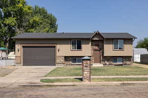 Front of home with oversized garage