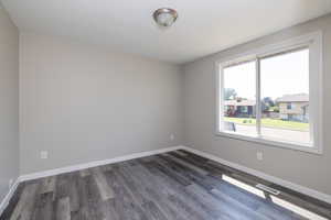 Bedroom 1 with large window and lots of natural light