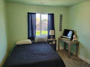 Bedroom featuring carpet floors