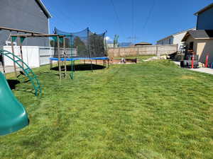 View of yard Lots of room to play and relax in the big yard.  Although not easily visible, it has a very nice fire pit.