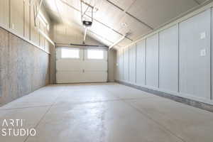 Lower Level Garage with a garage door opener