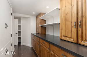 Interior space featuring dark hardwood / wood-style floors