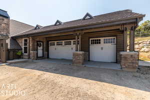 View of front of home featuring a garage