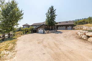 Ranch-style house featuring a garage