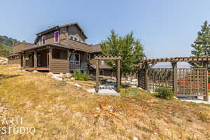 View of yard featuring a pergola and a patio area