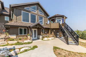 View of back of house with french doors