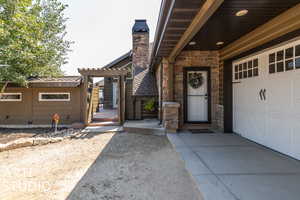 Property entrance with a garage