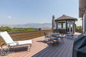 Deck featuring grilling area and a mountain view