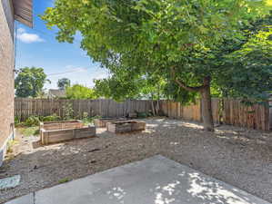 Xeriscaped backyard with planter boxes