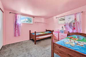 View of carpeted bedroom