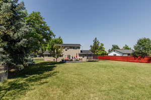 View of yard with a trampoline