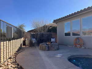 View of patio / terrace with an outdoor fire pit