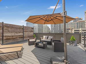 Wooden deck with an outdoor hangout area