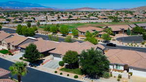 Birds eye view of property with a mountain view